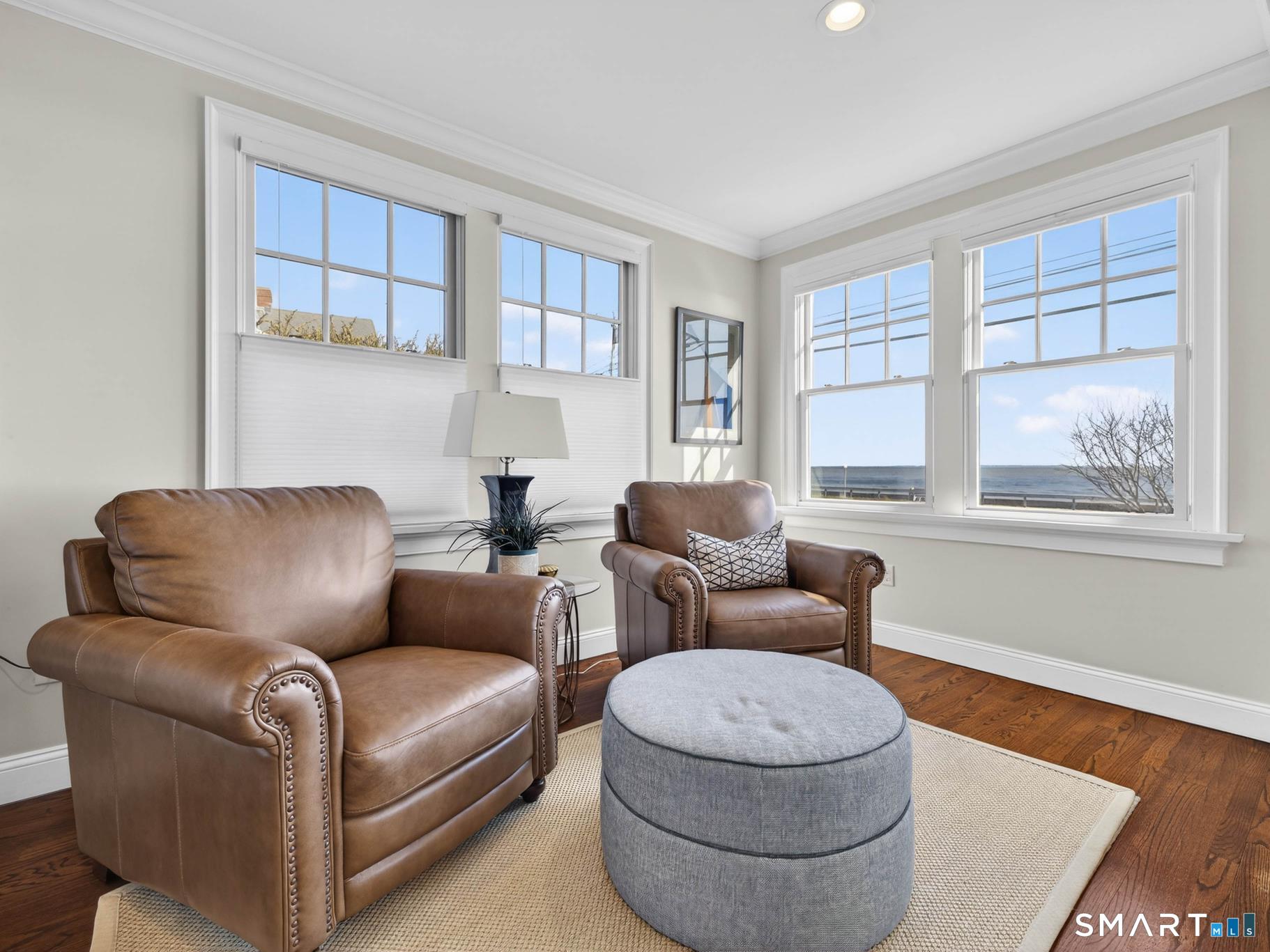 382 Maple Avenue Old Saybrook, CT 06475 - Photo 10 of 42 a living room with furniture and a window