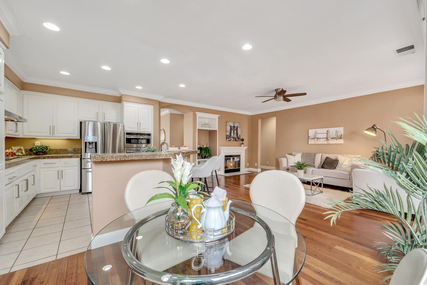 348 Riesling Court Fremont, CA 94539 - Photo 13 of 19 a living room with kitchen island furniture and a kitchen view