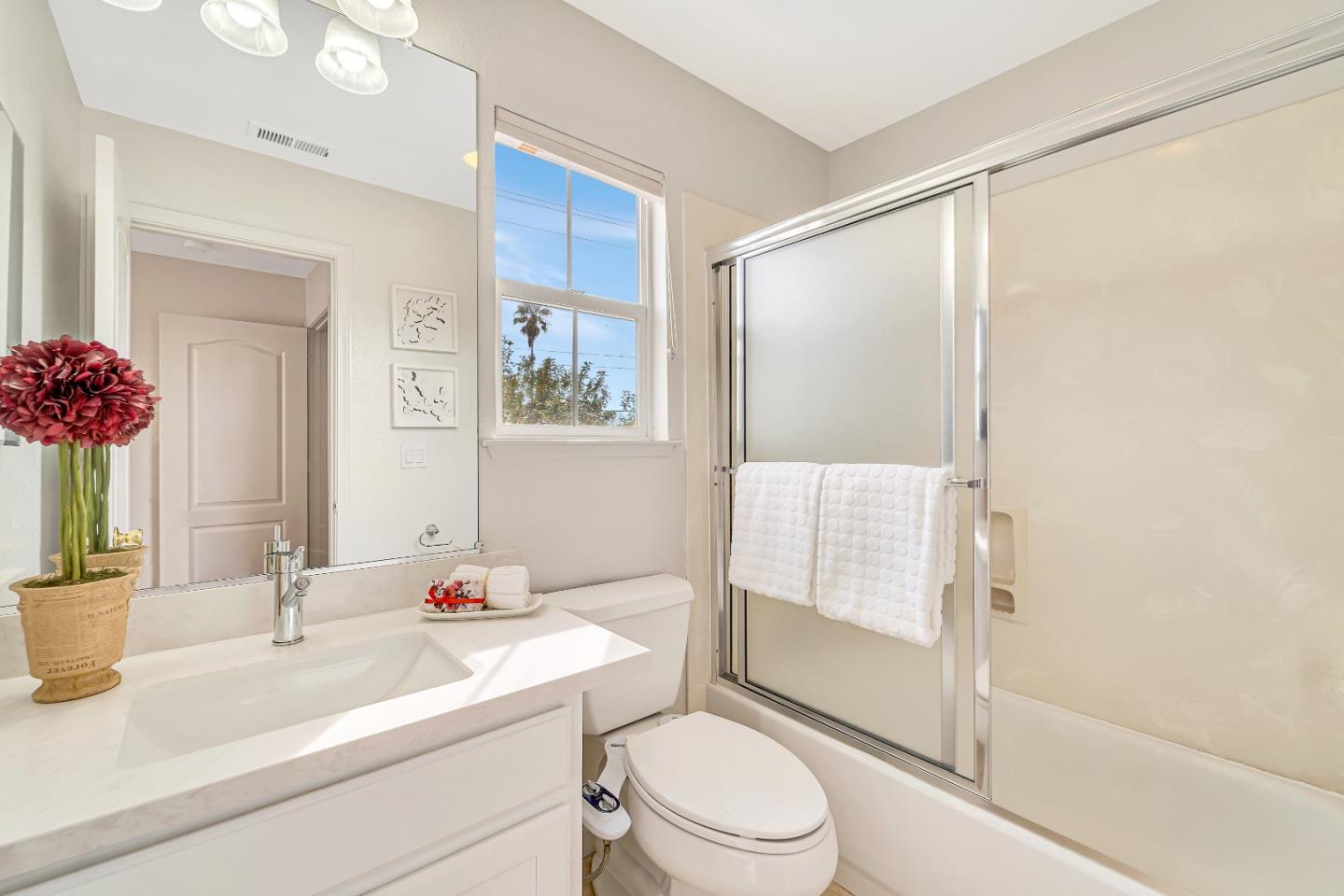 348 Riesling Court Fremont, CA 94539 - Photo 15 of 19 a bathroom with a sink toilet and shower