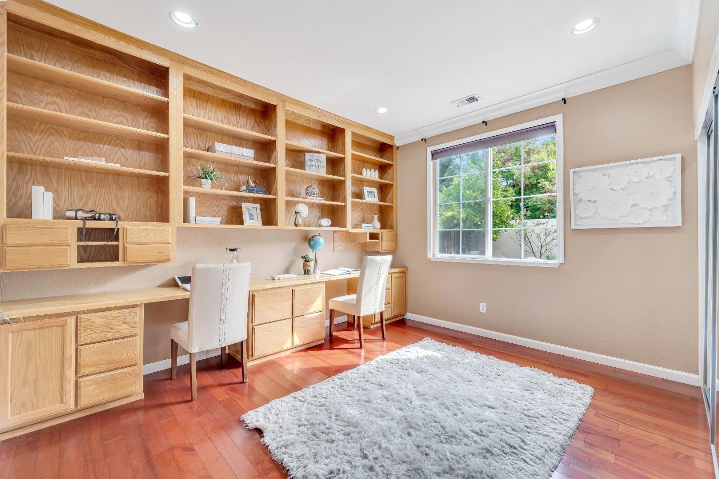348 Riesling Court Fremont, CA 94539 - Photo 17 of 19 a living room with furniture and a wooden floor
