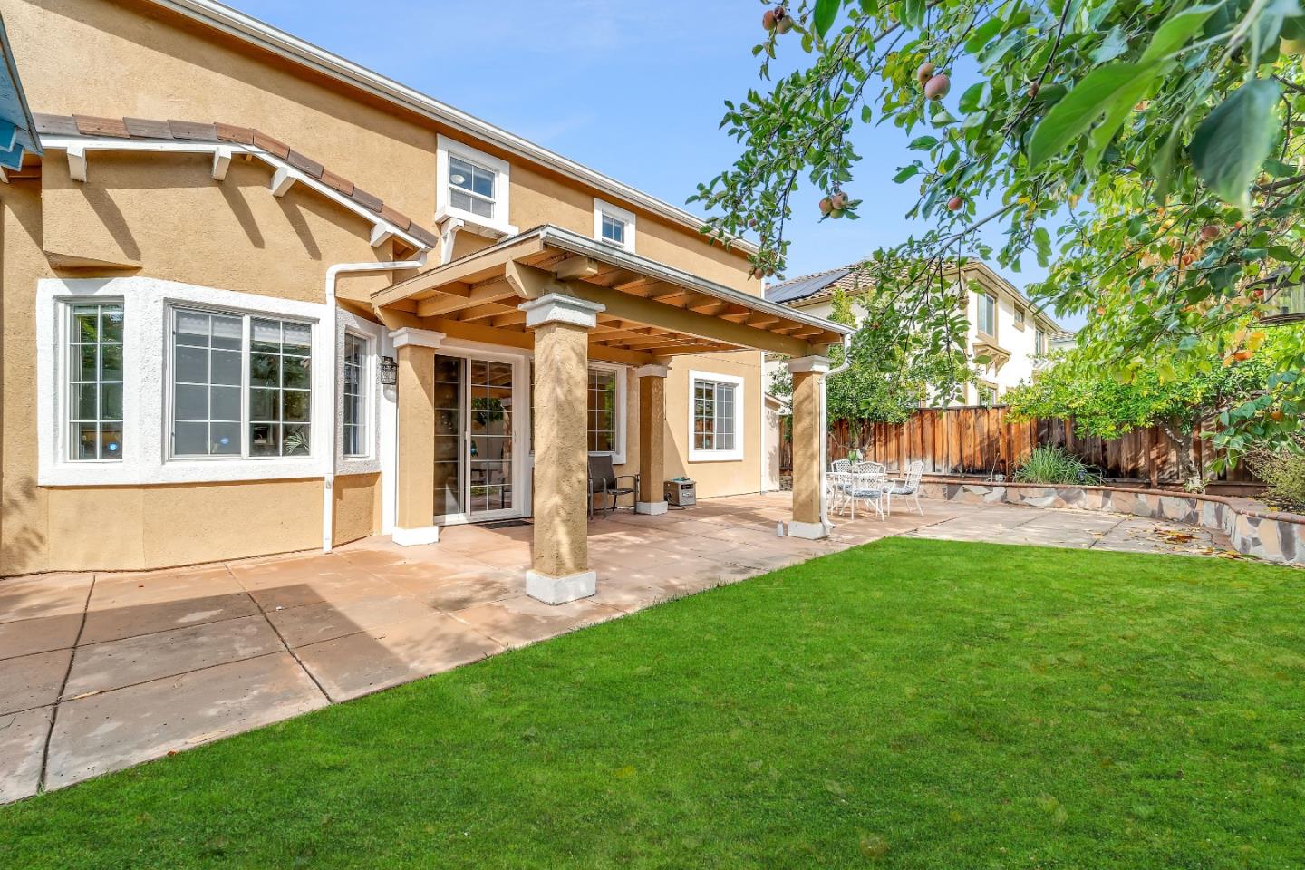 348 Riesling Court Fremont, CA 94539 - Photo 18 of 19 a view of a house with a backyard
