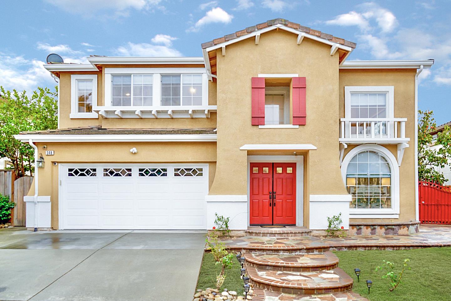 348 Riesling Court Fremont, CA 94539 - Photo 3 of 19 a front view of a house with a yard