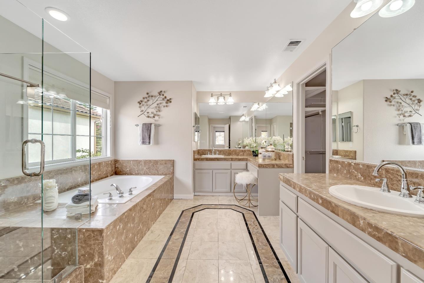 348 Riesling Court Fremont, CA 94539 - Photo 6 of 19 a spacious bathroom with a tub sink and mirror