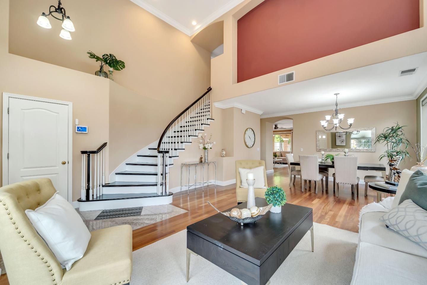348 Riesling Court Fremont, CA 94539 - Photo 8 of 19 a living room with fireplace furniture and a chandelier
