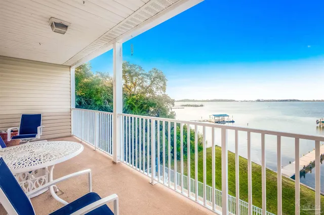 a view of balcony with furniture