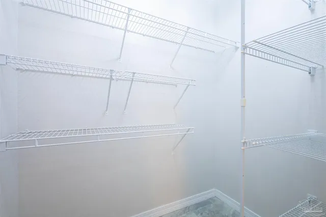 a view of a cars park in front of building