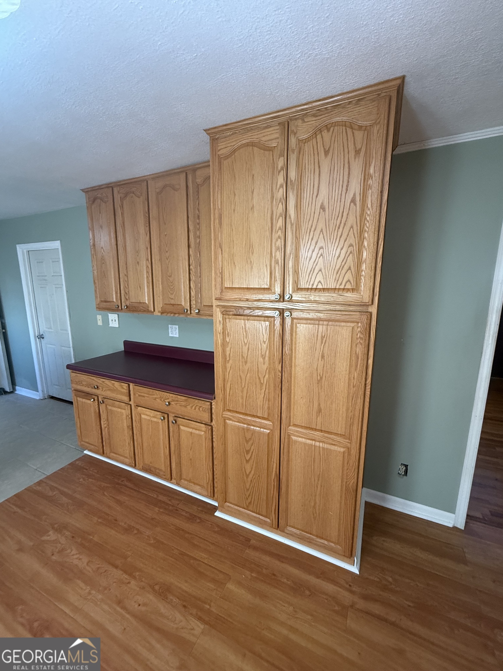 2068 Old Dalton Road Northeast Rome, GA 30165 - Photo 16 of 37 a view of a kitchen with wooden floor