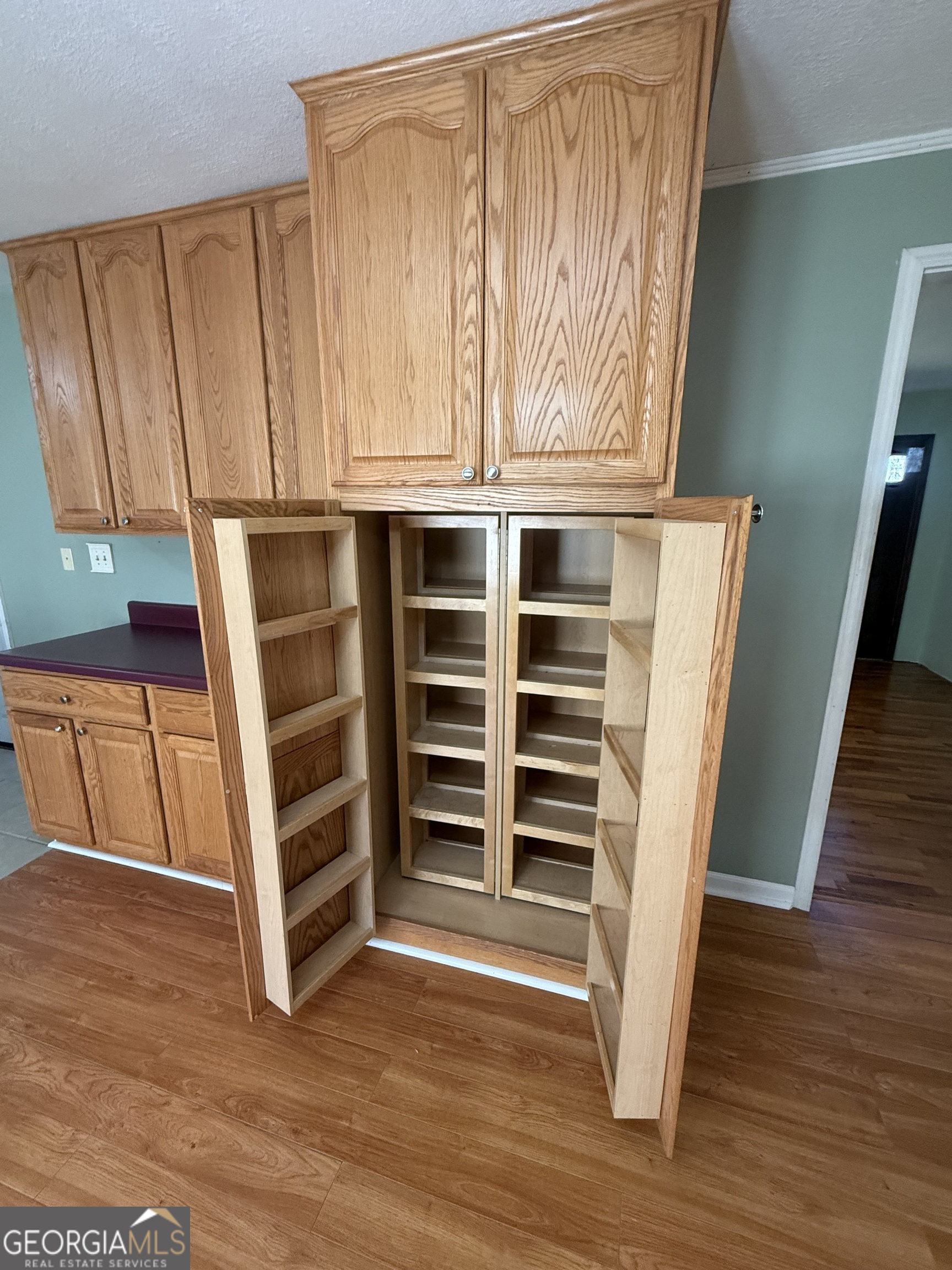 2068 Old Dalton Road Northeast Rome, GA 30165 - Photo 17 of 37 a view of walk in closet with empty racks