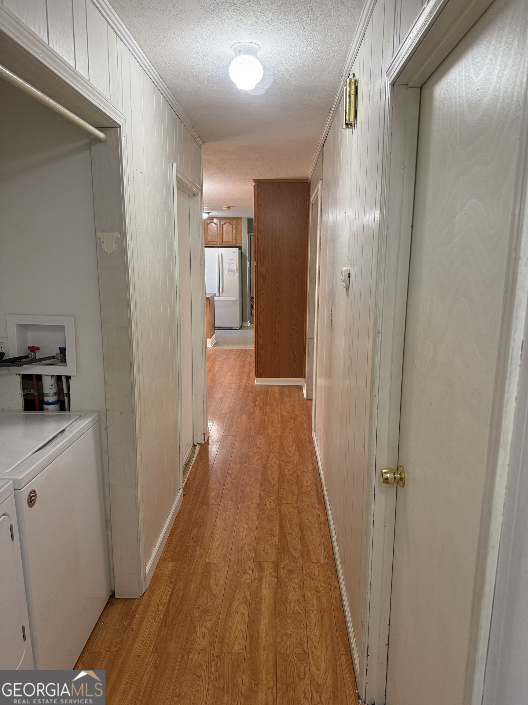2068 Old Dalton Road Northeast Rome, GA 30165 - Photo 26 of 37 a view of a hallway with wooden floor and closet