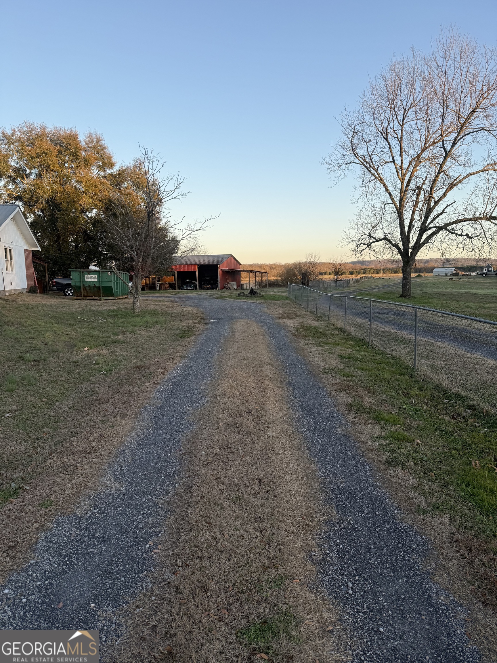 2068 Old Dalton Road Northeast Rome, GA 30165 - Photo 3 of 37 a view of dirt yard with a large tree