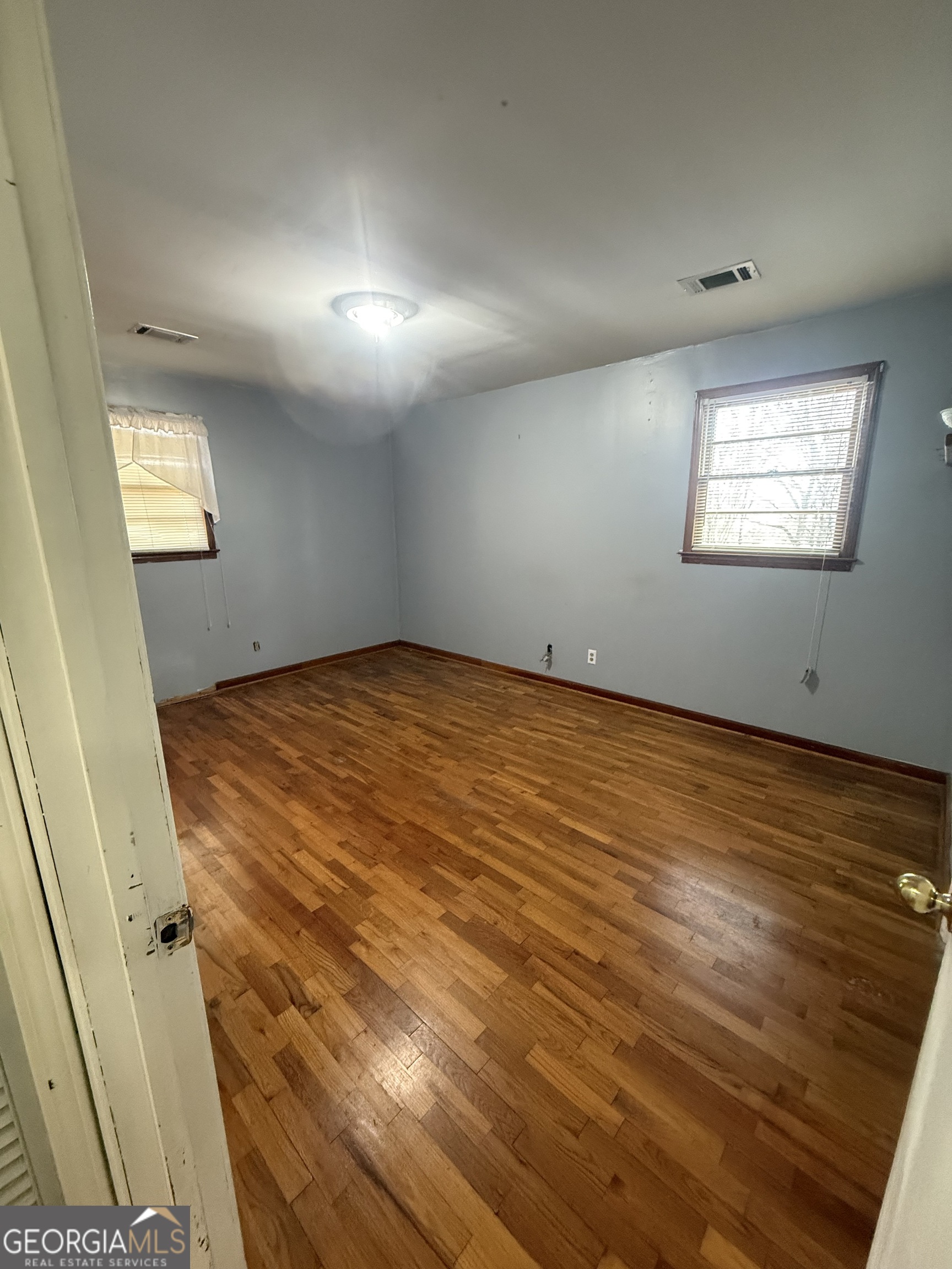 2068 Old Dalton Road Northeast Rome, GA 30165 - Photo 34 of 37 an empty room with windows