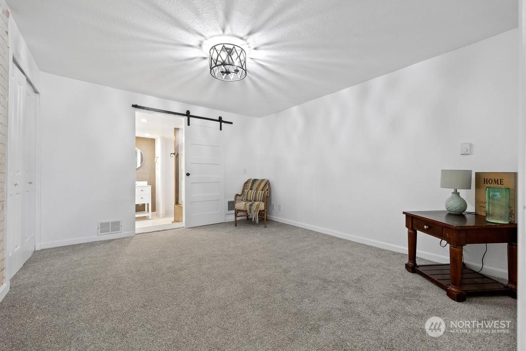 206 South Anderson Street Kennewick, WA 99336 - Photo 14 of 29 a view of a livingroom with a chandelier furniture and a chandelier fan