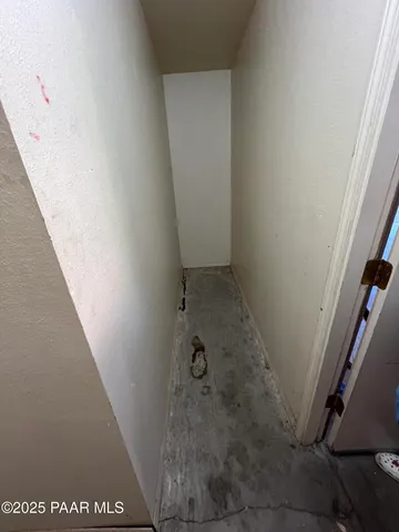 a view of an empty room and window