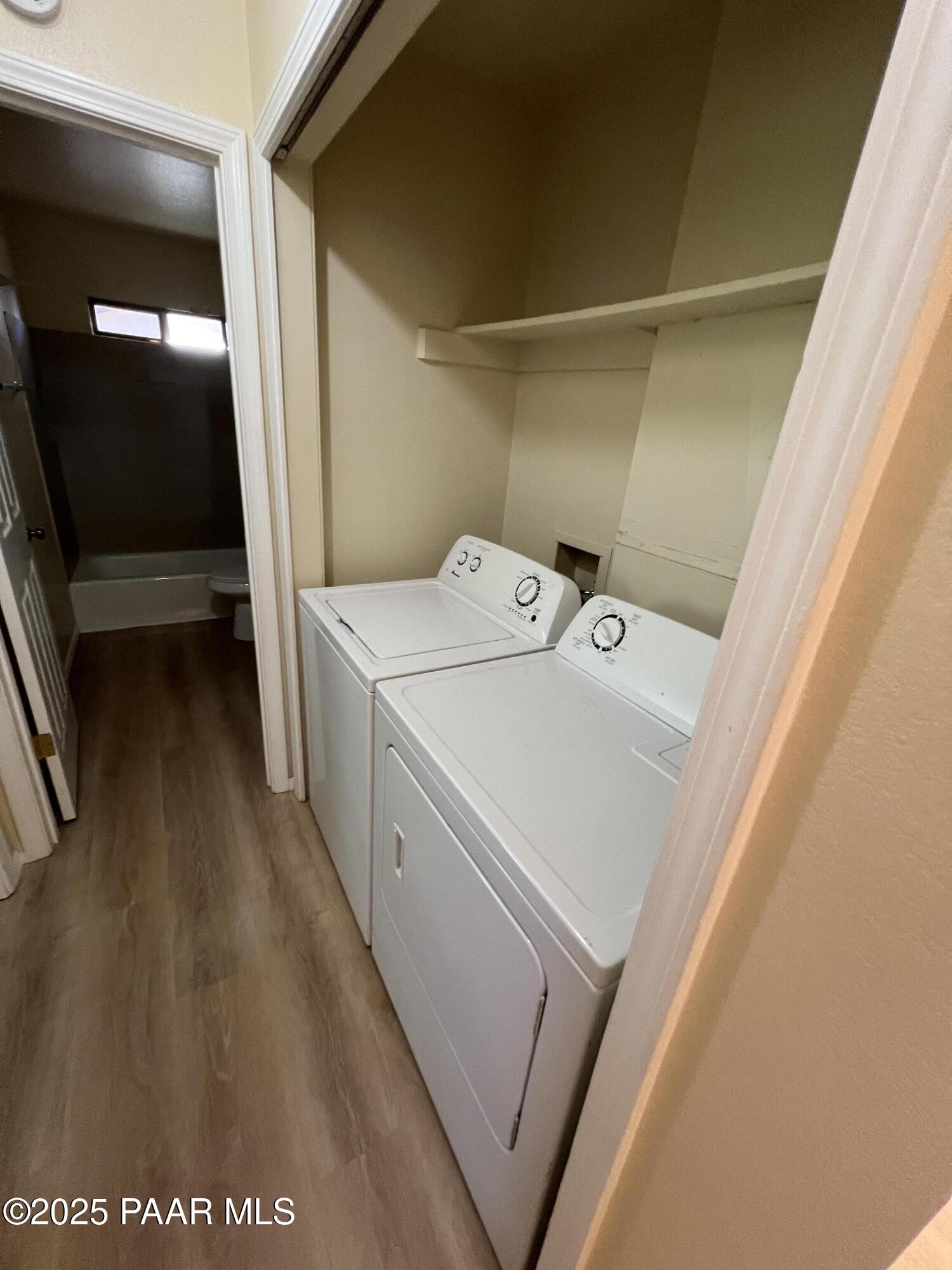 8860 East Yavapai Road, Unit C Prescott Valley, AZ 86314 - Photo 17 of 17 a utility room with dryer and washer