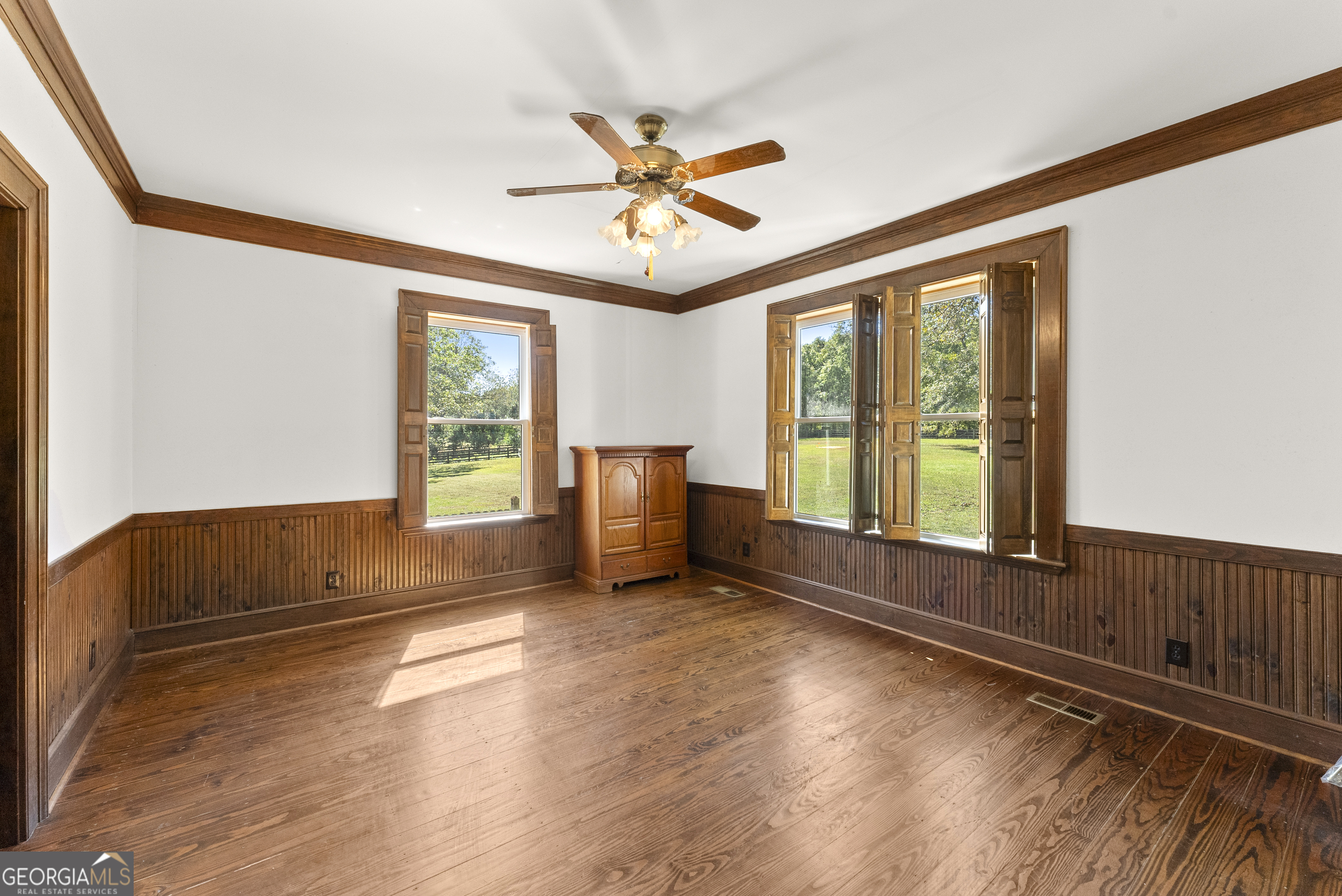 1972 Rest Haven Road Yatesville, GA 31097 - Photo 29 of 52 a living room with hardwood floor and windows