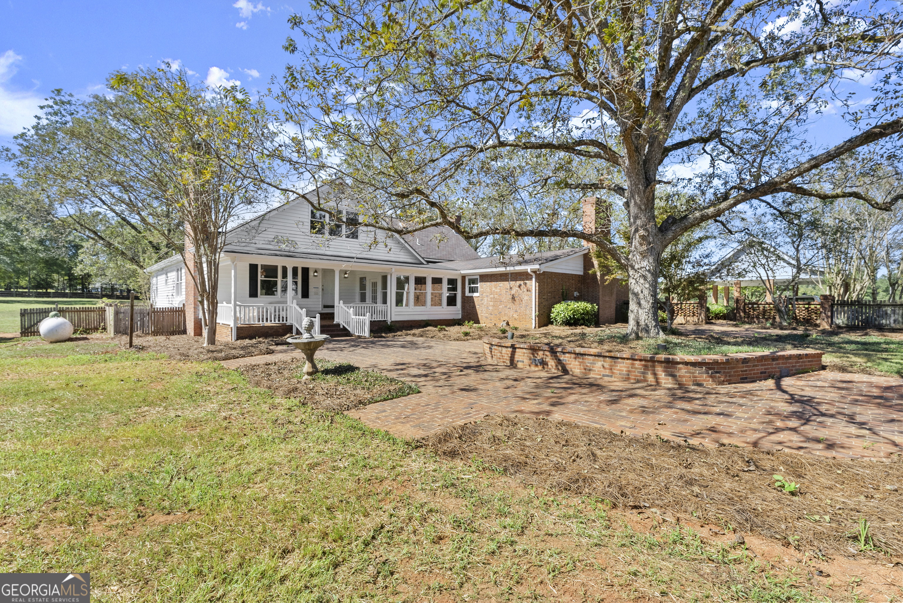 1972 Rest Haven Road Yatesville, GA 31097 - Photo 36 of 52 a house with trees in front of it