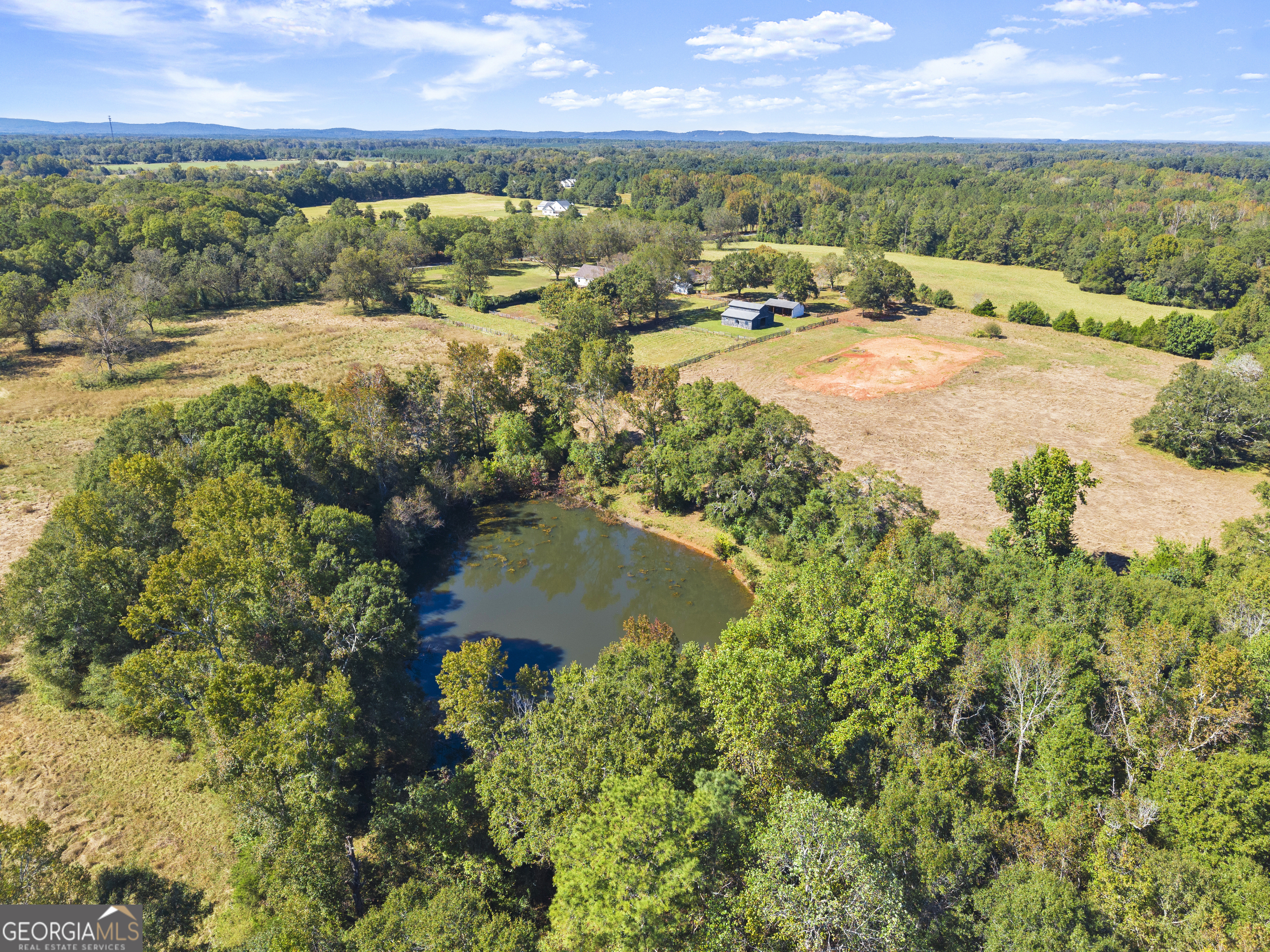1972 Rest Haven Road Yatesville, GA 31097 - Photo 46 of 52 a view of a lake with a mountain