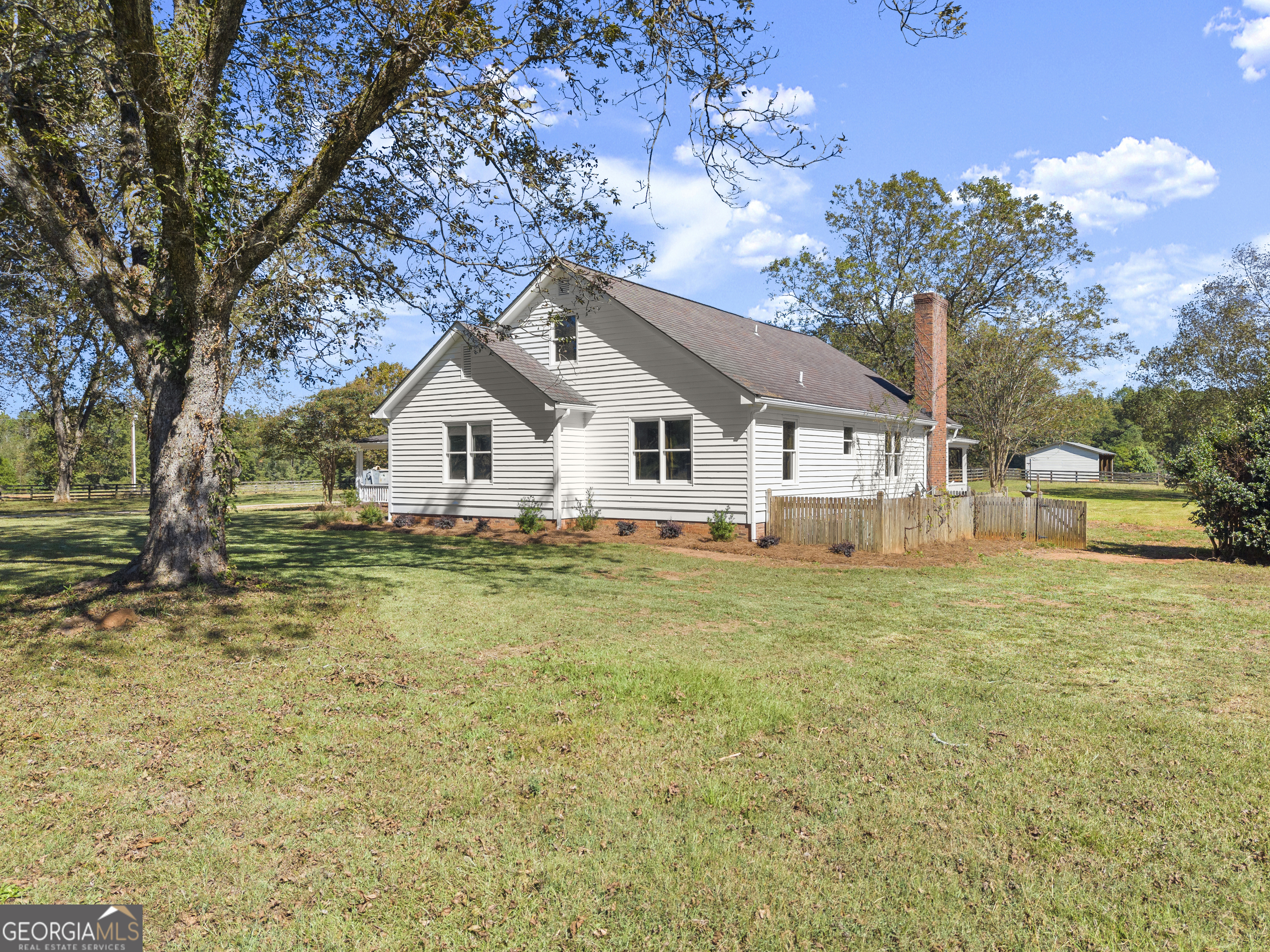 1972 Rest Haven Road Yatesville, GA 31097 - Photo 5 of 52 a house view with a garden space