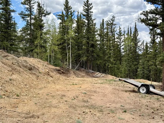 a view of swimming pool with a yard