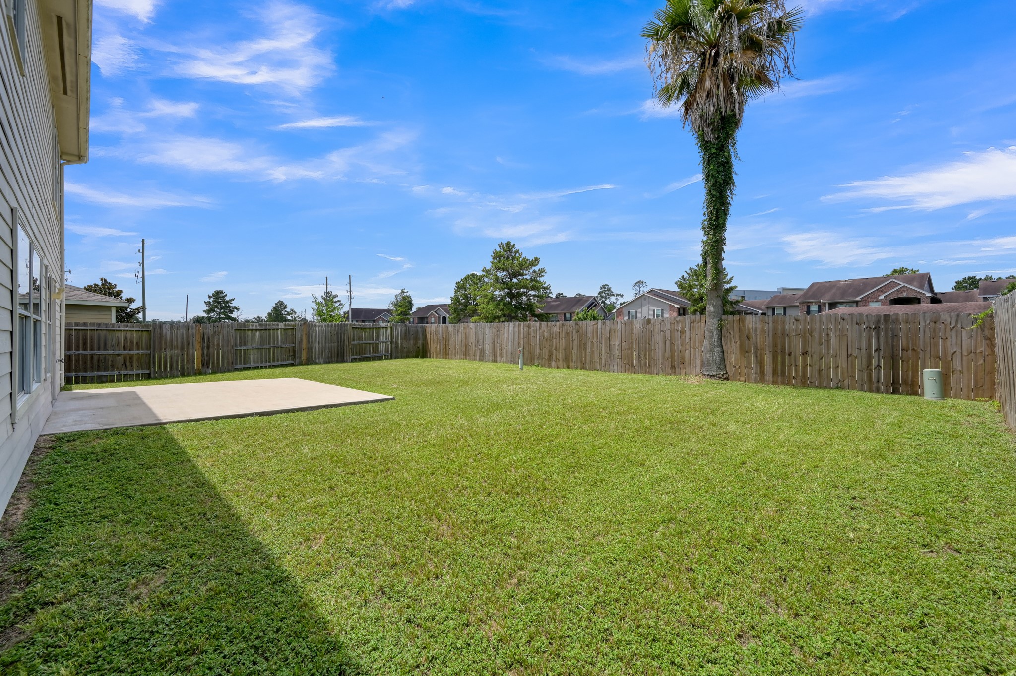 23919 Kingbriar Drive Spring, TX 77373 - Photo 31 of 33 Step outside to a fully fenced backyard with plenty of room for pets, play, gardening, or creating your own outdoor retreat.