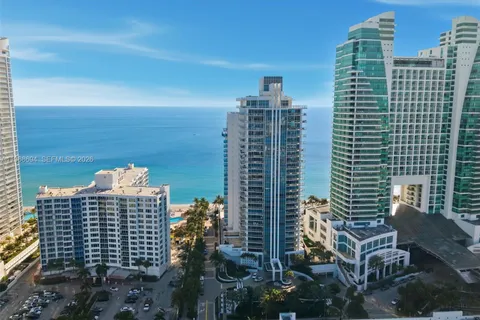 a view of a city with tall buildings