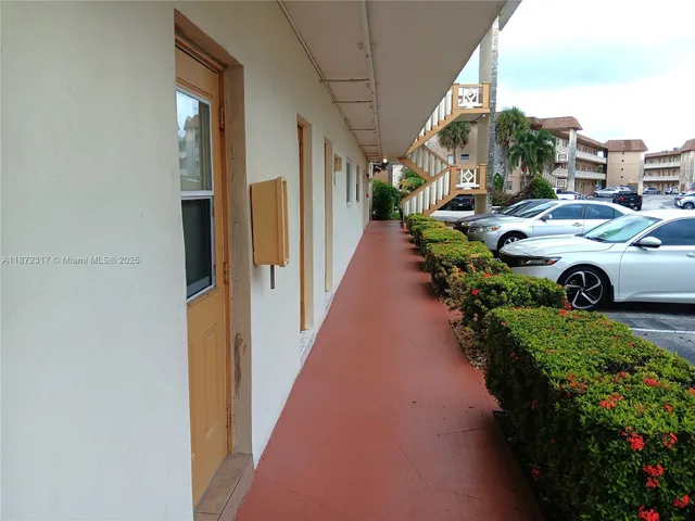 a view of a porch with furniture