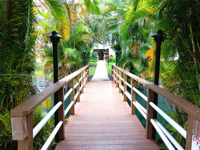 a view of balcony and yard