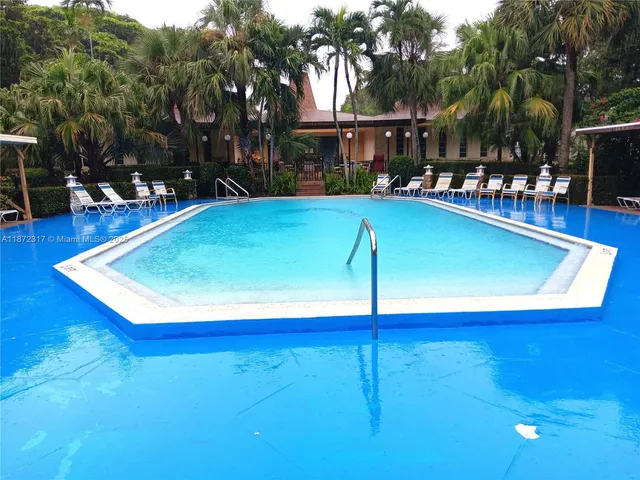 a view of a backyard with a patio