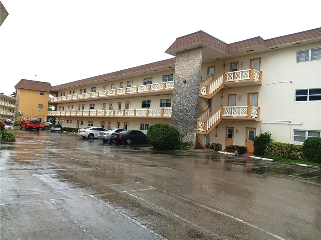 a view of a building with a street