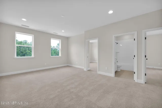 an empty room with windows