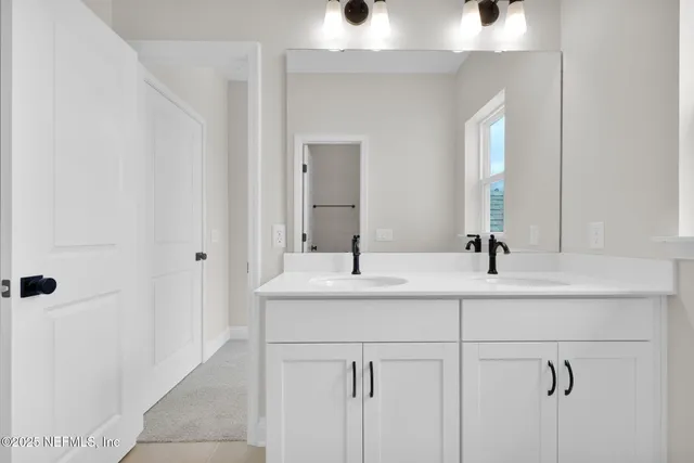 a bathroom with a toilet and a bathtub