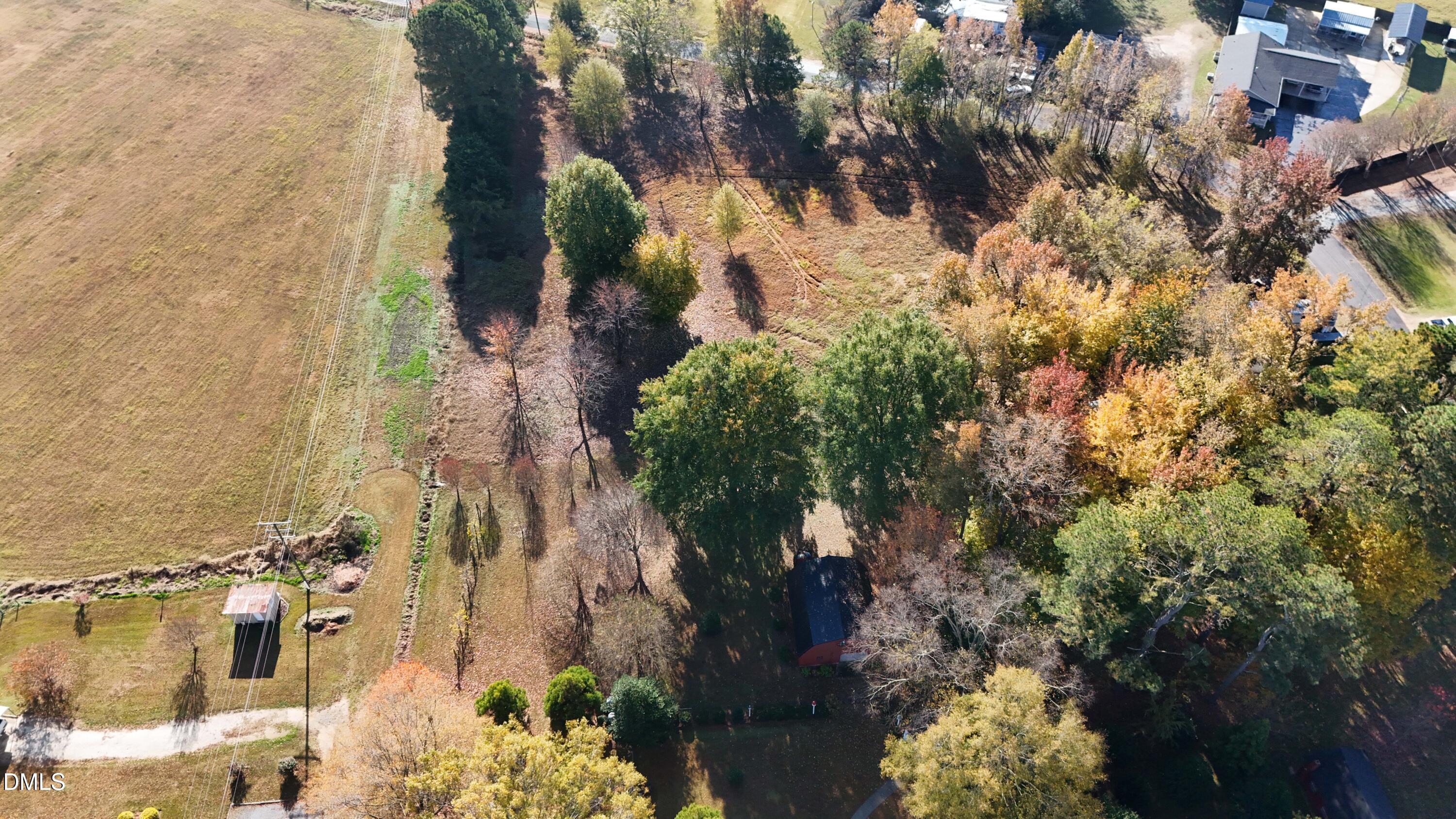 0 Bait Road Dunn, NC 28334 - Photo 33 of 38 an aerial view of residential houses with outdoor space