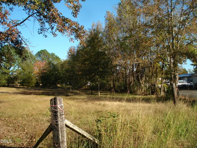 a view of swimming pool with a yard