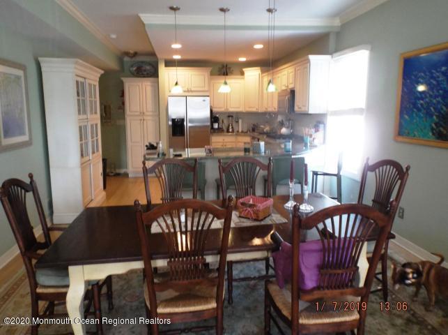 15 Main Avenue, Unit 2 Ocean Grove, NJ 07756 - Photo 2 of 15 a view of a dining room with furniture