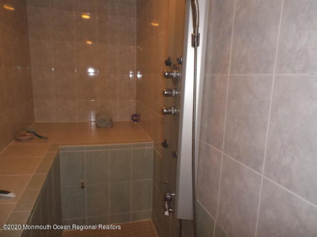 15 Main Avenue, Unit 2 Ocean Grove, NJ 07756 - Photo 10 of 15 a bathroom with a shower