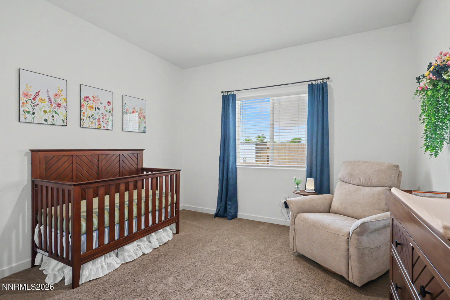 606 Sycamore Drive Fallon, NV 89406 - Photo 14 of 26 a bedroom with furniture and a window