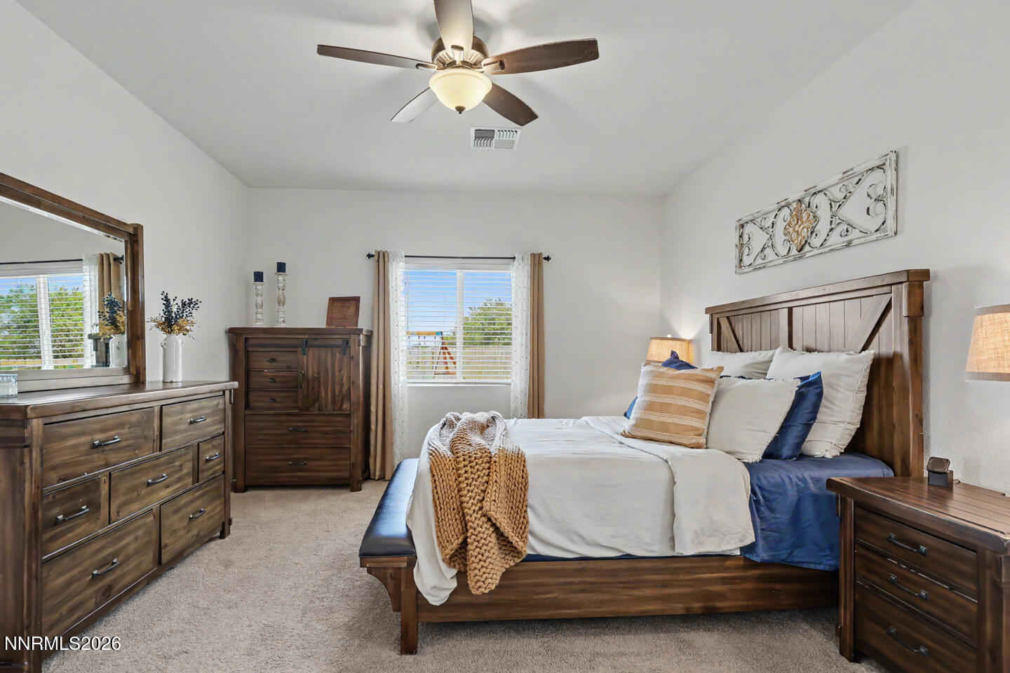 606 Sycamore Drive Fallon, NV 89406 - Photo 16 of 26 a bedroom with a bed and furniture
