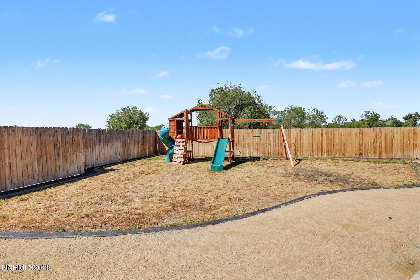 606 Sycamore Drive Fallon, NV 89406 - Photo 24 of 26 a view of a backyard