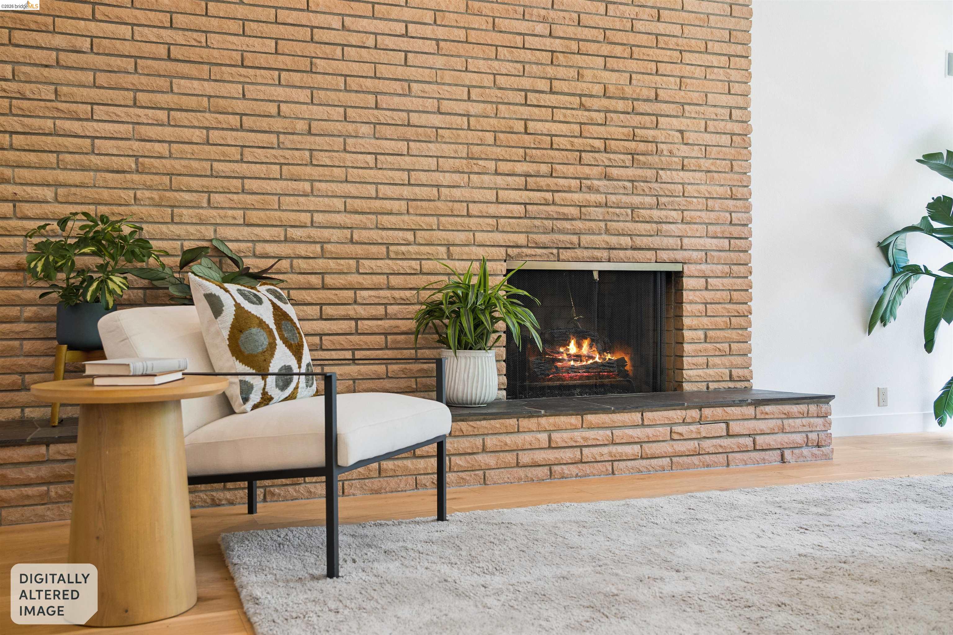 7 Jo Lin Court El Sobrante, CA 94803 - Photo 29 of 99 Brick fireplace with a stone hearth and a metal firebox