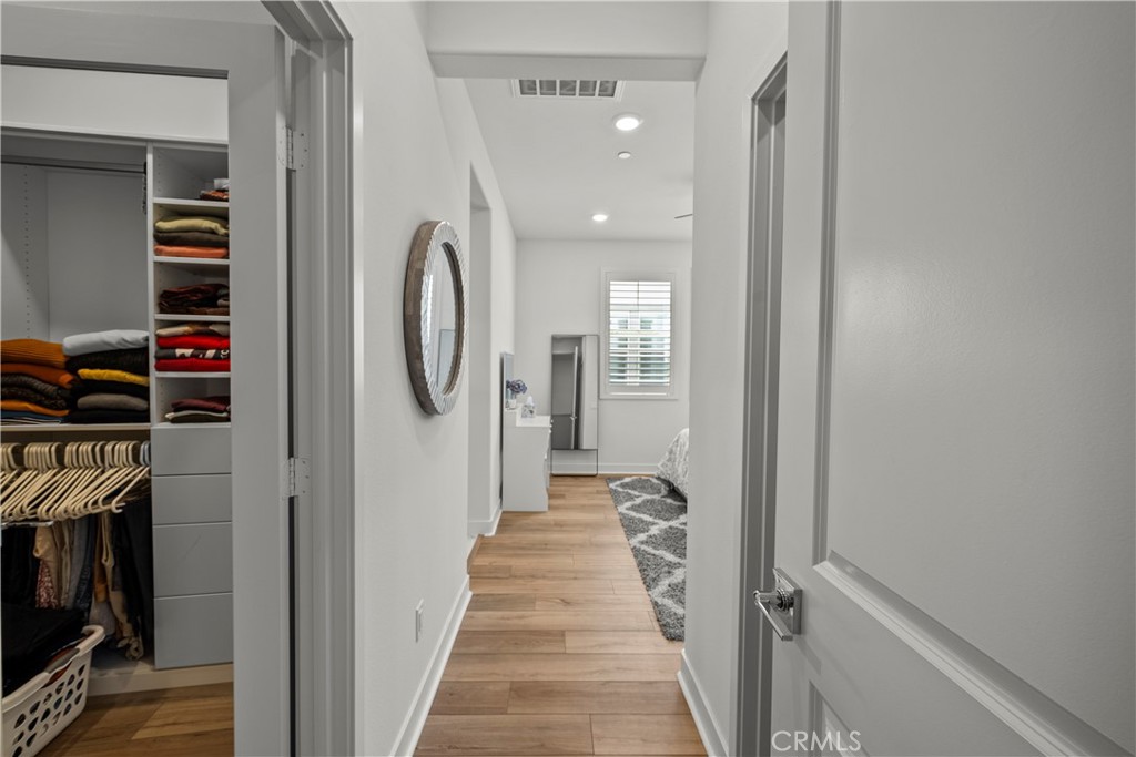 1663 Rosewell Road West Covina, CA 91791 - Photo 19 of 45 a view of a hallway with painted walls