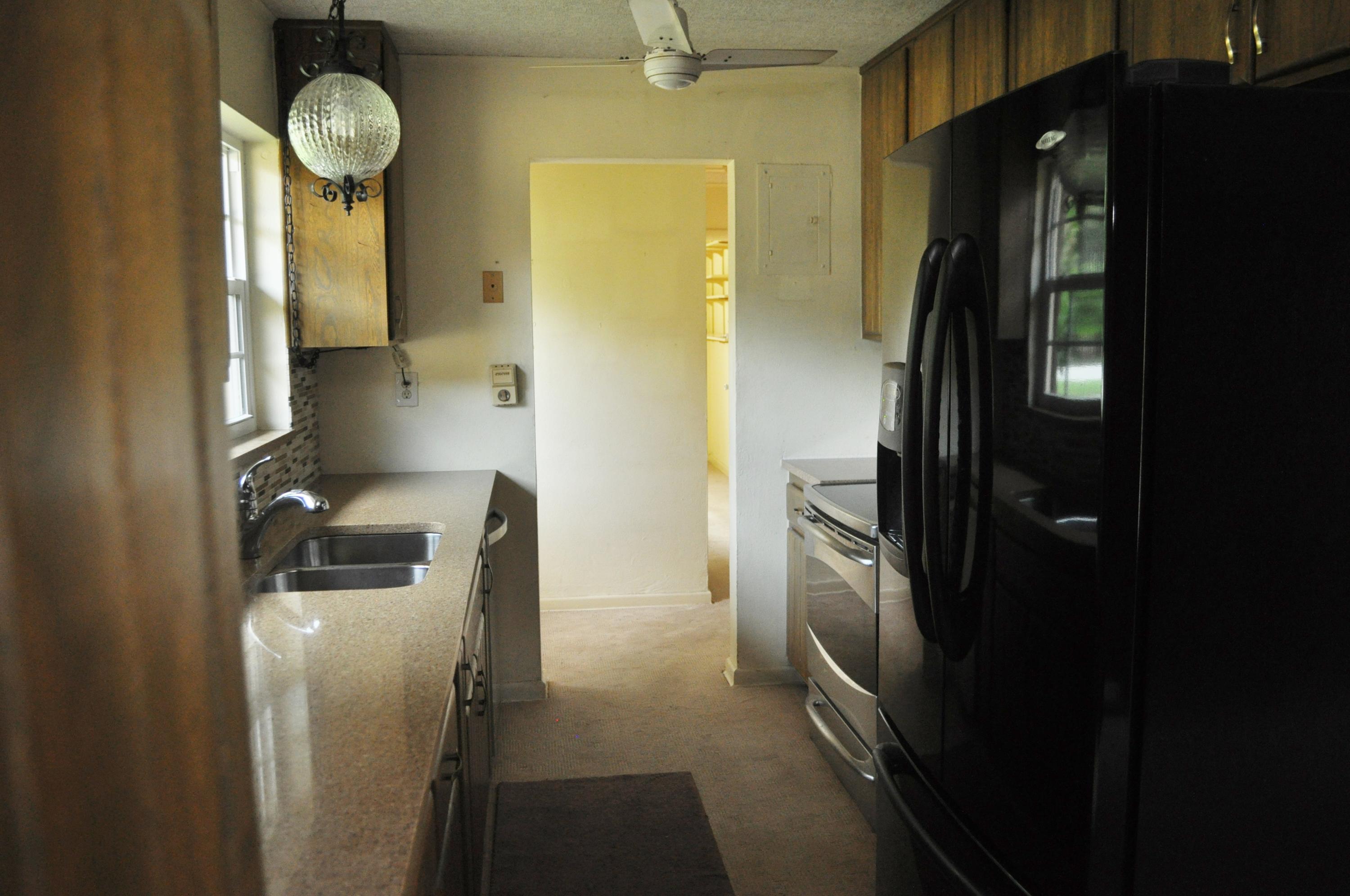 933 Firetree Road North Palm Beach, FL 33408 - Photo 5 of 16 Kitchen