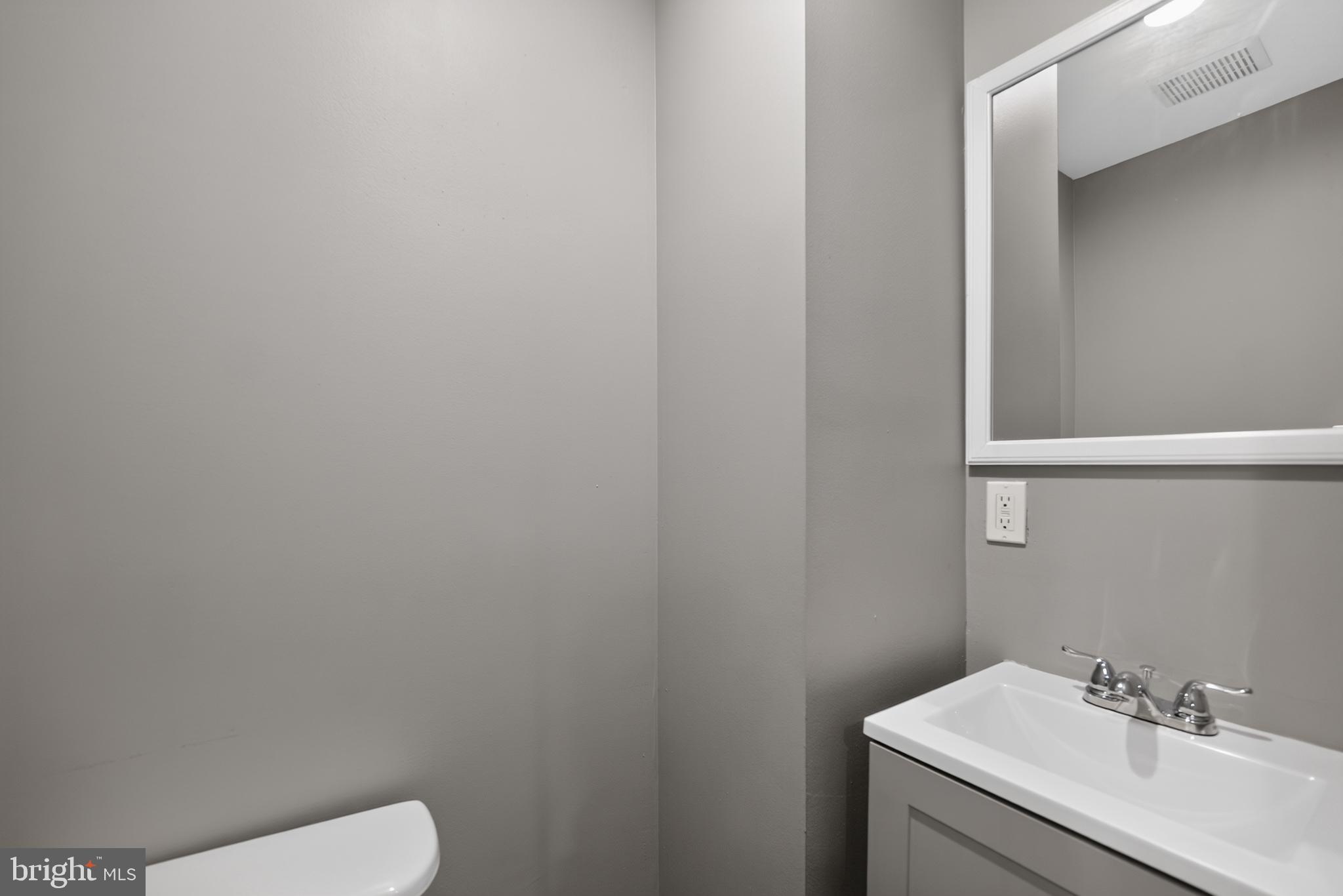 1258 Carroll Street Baltimore, MD 21230 - Photo 14 of 32 Main Floor Half Bathroom