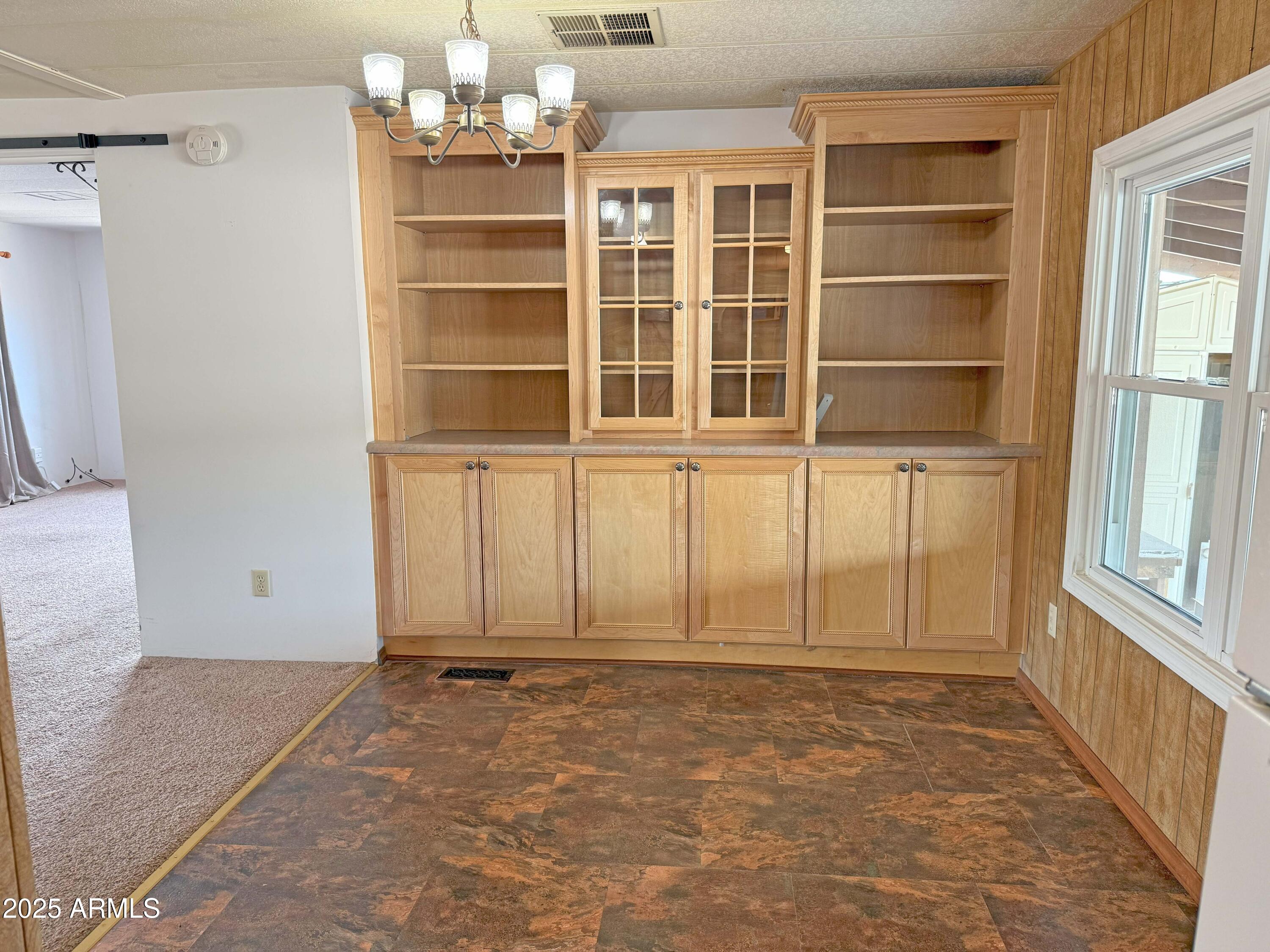 4715 North Drifting Sands Road Rimrock, AZ 86335 - Photo 11 of 39 a view of an empty room with a window
