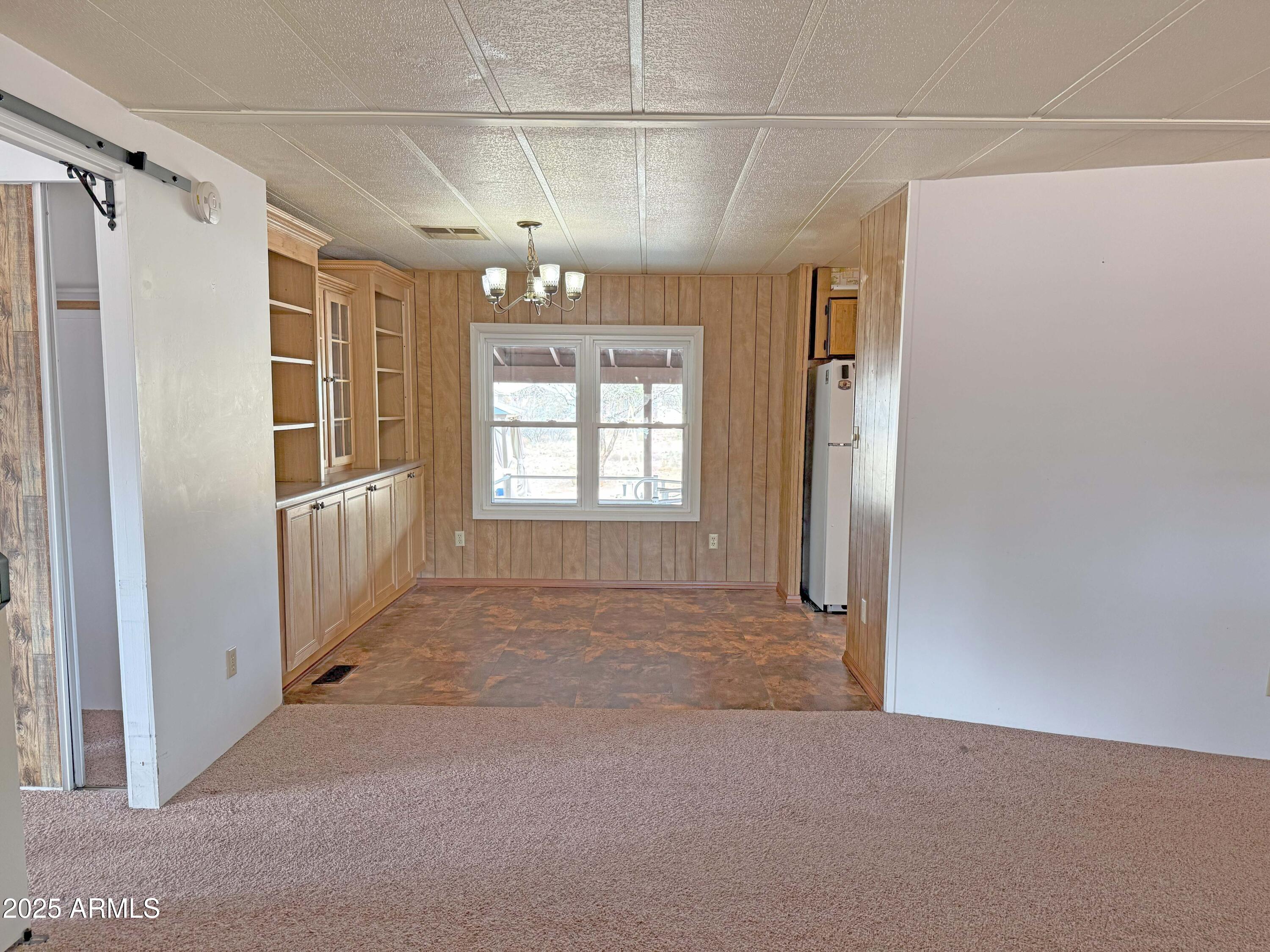 4715 North Drifting Sands Road Rimrock, AZ 86335 - Photo 13 of 39 a view of hallway with a window