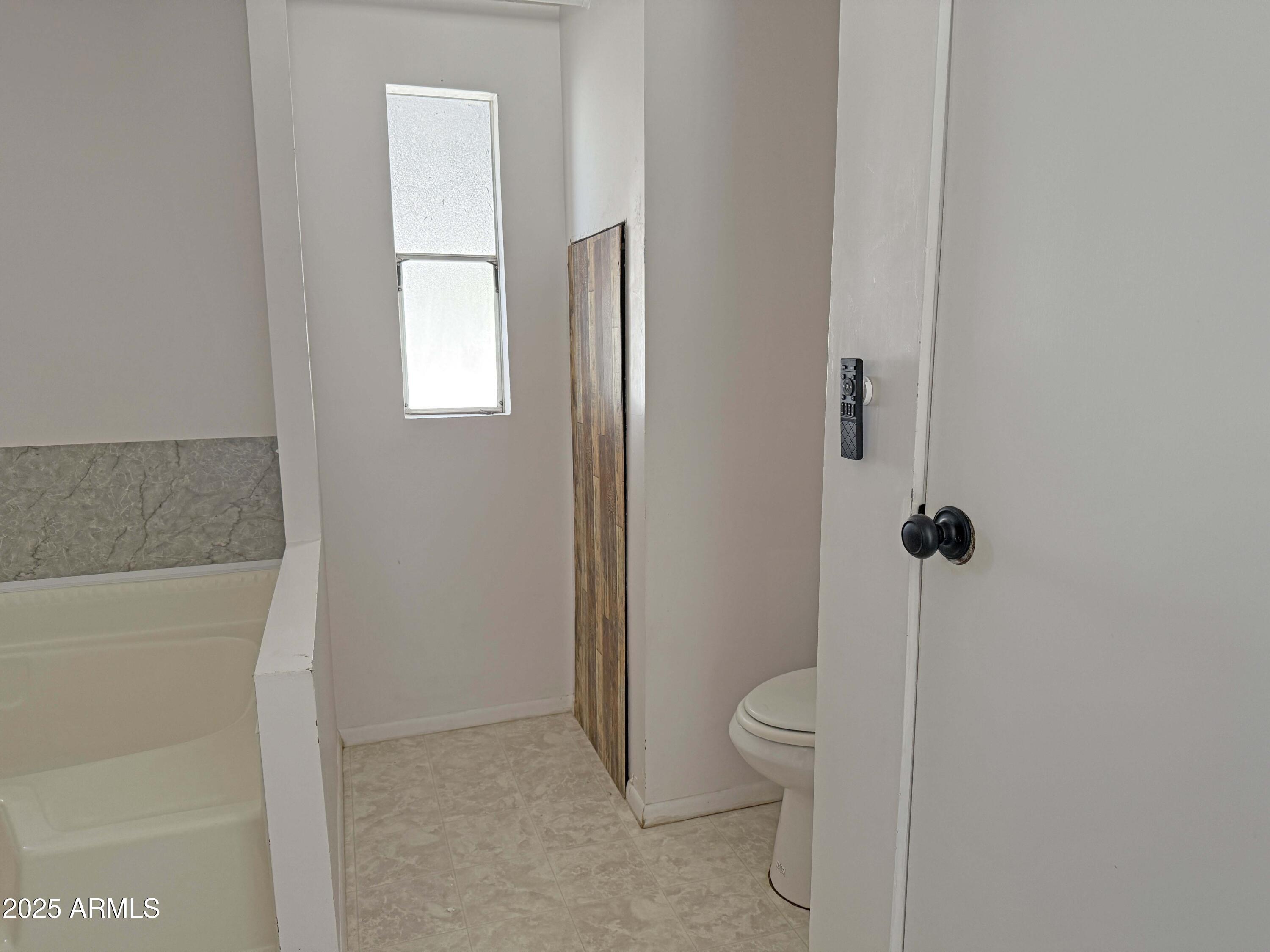 4715 North Drifting Sands Road Rimrock, AZ 86335 - Photo 17 of 39 a bathroom with a toilet and a shower