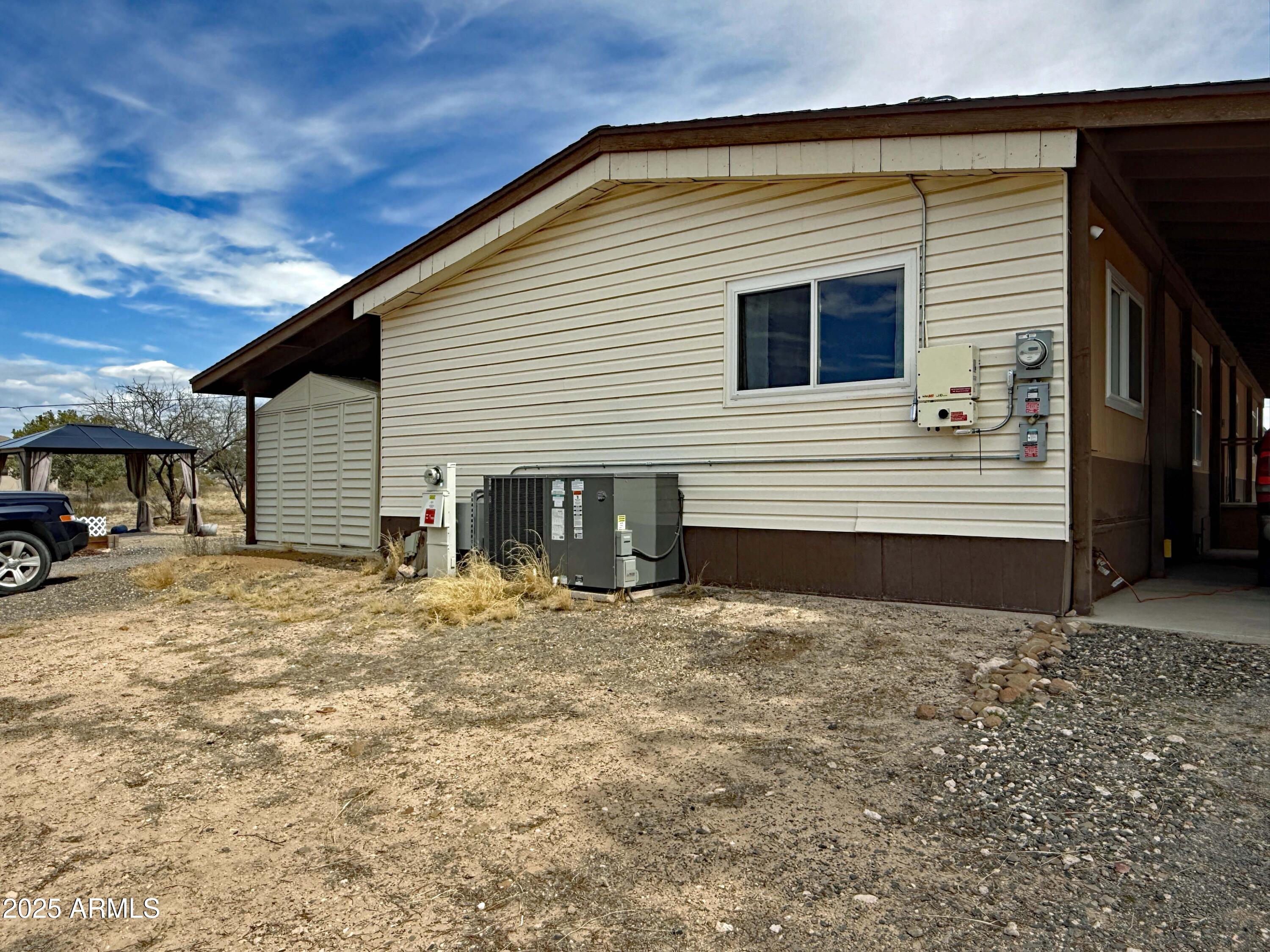 4715 North Drifting Sands Road Rimrock, AZ 86335 - Photo 2 of 39 a view of a house with a patio