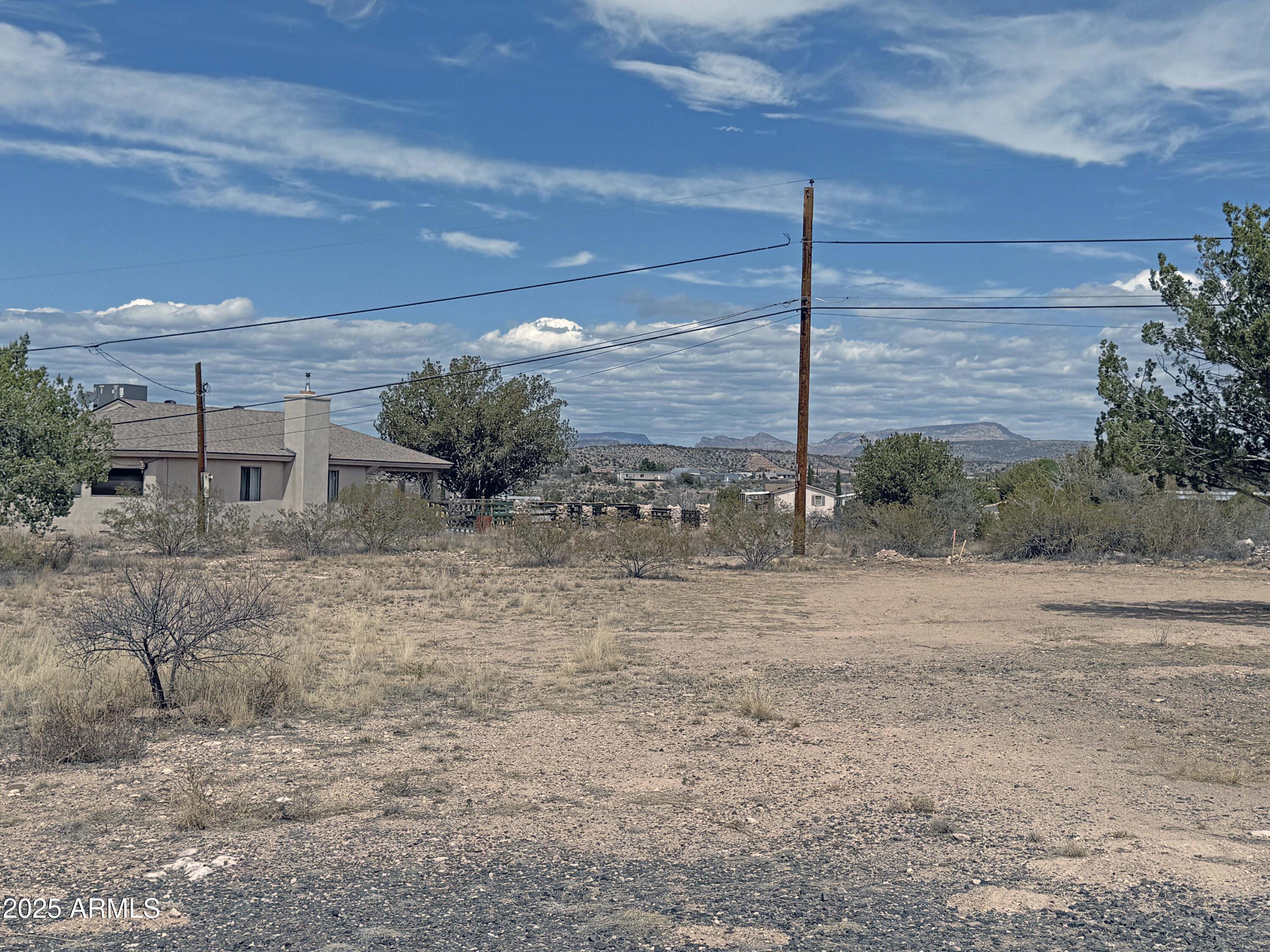4715 North Drifting Sands Road Rimrock, AZ 86335 - Photo 38 of 39 a view of a dry yard with wooden fence
