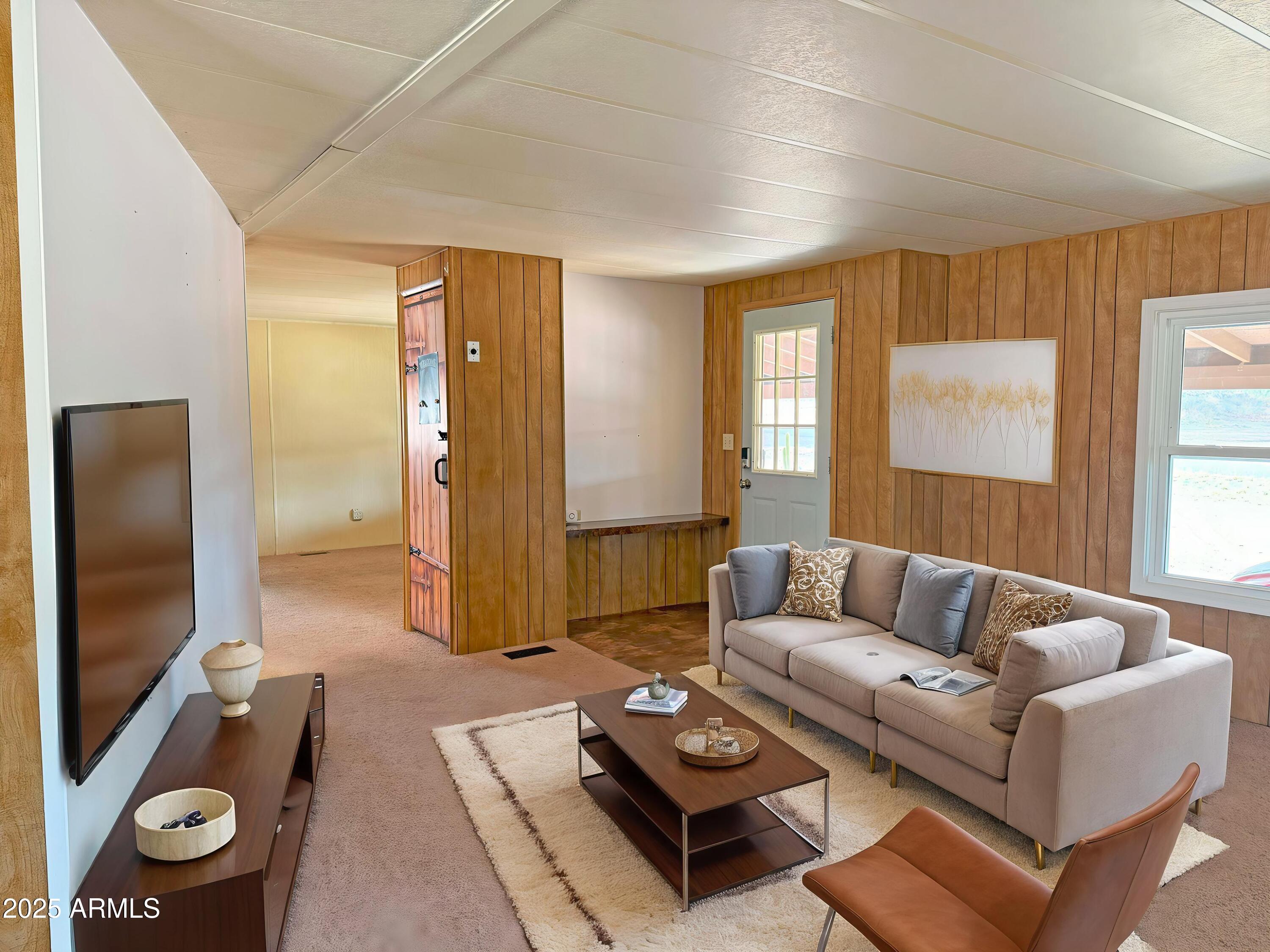 4715 North Drifting Sands Road Rimrock, AZ 86335 - Photo 6 of 39 a living room with furniture and a flat screen tv