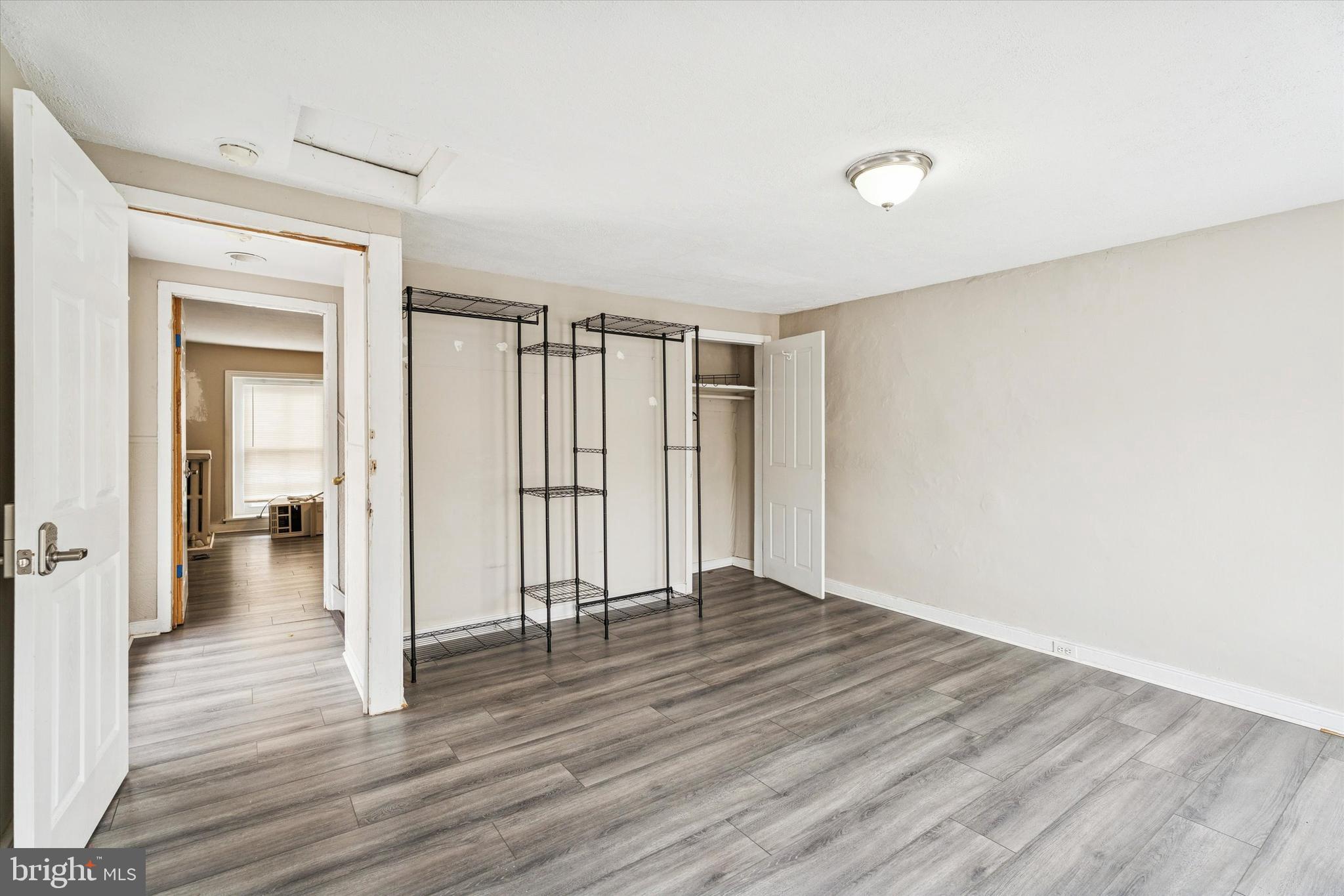 352 Carson Street Philadelphia, PA 19128 - Photo 28 of 35 wooden floor in an empty room