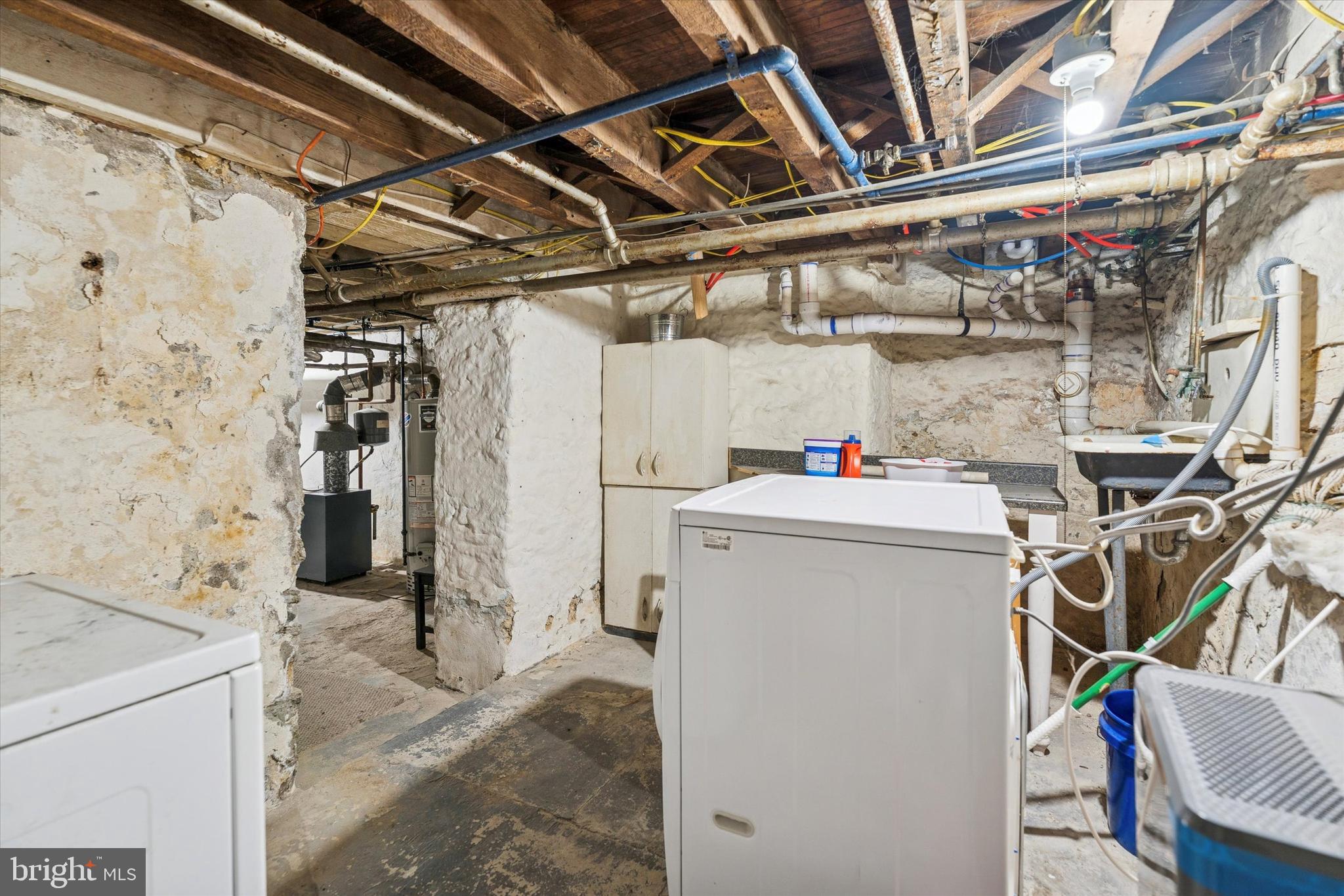 352 Carson Street Philadelphia, PA 19128 - Photo 34 of 35 a utility room with dryer and washer